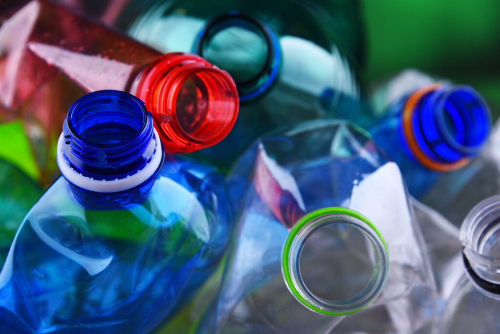 What is plastic? Plastic and its variants. Empty colored plastic bottles.
